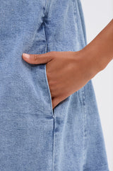 PLEATED UP MINI DRESS IN DENIM