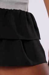 OVERTHINKING IS GREAT MINI SKIRT IN BLACK