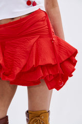 JANEY MICRO MINI RUFFLE SKIRT IN RED