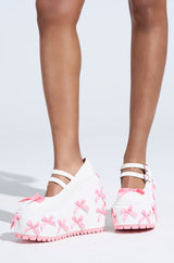 KOI FOOTWEAR A COURTSHIP OF BOWS PINK WEDGE SNEAKER
