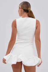 FAHARI RUFFLE HEM MINI DRESS IN WHITE