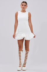 FAHARI RUFFLE HEM MINI DRESS IN WHITE
