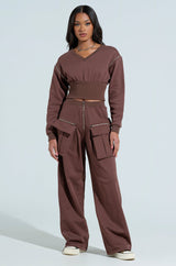 NIA CORSETED ZIPPERED LONGSLEEVE SWEATSHIRT