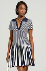 ALINA PLEATED KNIT FIT AND FLARE MINI DRESS IN NAVY