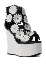 AZALEA WANG FLOWER EMBELLISHED WEDGE SANDAL IN BLACK