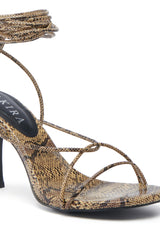 AKIRA HIGH TOWER NUDE SNAKE LACE UP SANDAL