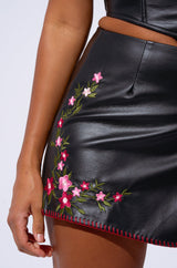 BACK IT UP MINI SKIRT