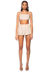 DIAMONDS DANCING PLEATED MINI SKIRT IN BEIGE
