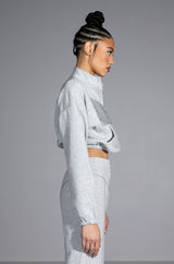 DRIPPING JEWELS HALF ZIP SWEATSHIRT