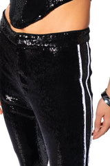GET DOWN ON IT SEQUIN FLARE TROUSER IN BLACK