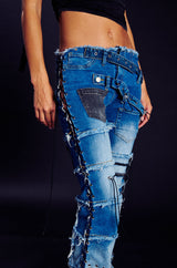 LAY LOW DISTRESSED DENIM FLARE PANT