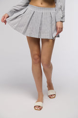 LEAVE IT BETTER PLEATED MINI SKIRT