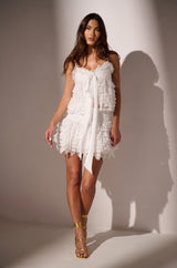 LOVE U ALWAYS RUFFLE MINI SKIRT IN WHITE