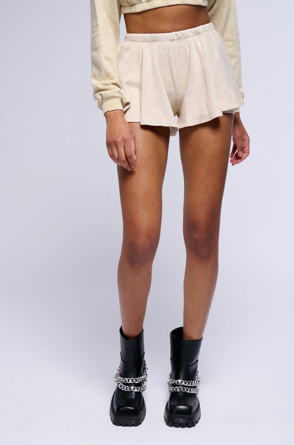 MYSTERY GIRL MINERAL WASH FLARE MINI SHORT IN IVORY