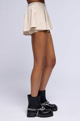 MYSTERY GIRL MINERAL WASH FLARE MINI SHORT IN IVORY
