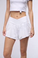 ON THE MOVE RUFFLE SHORT IN WHITE