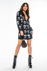 SERVING LOOKS IN THIS FASHION BLAZER WITH RHINESTONE SKULLS