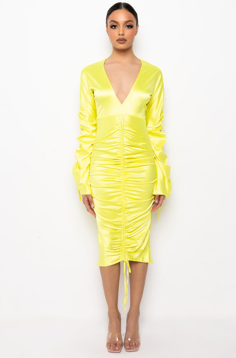 TALK ABOUT IT LOW V NECK RUCHED MIDI DRESS