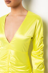 TALK ABOUT IT LOW V NECK RUCHED MIDI DRESS