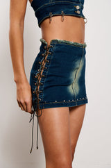 UNBOTHERED DISTRESSED DENIM MINI SKIRT
