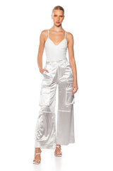 VIBING HOLOGRAPHIC FAUX LEATHER BODYSUIT IN WHITE