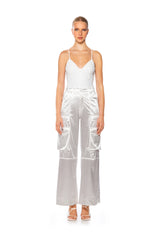 VIBING HOLOGRAPHIC FAUX LEATHER BODYSUIT IN WHITE