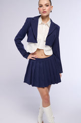 WHATS THE TEA PINSTRIPE PLEATED MINI SKIRT IN NAVY